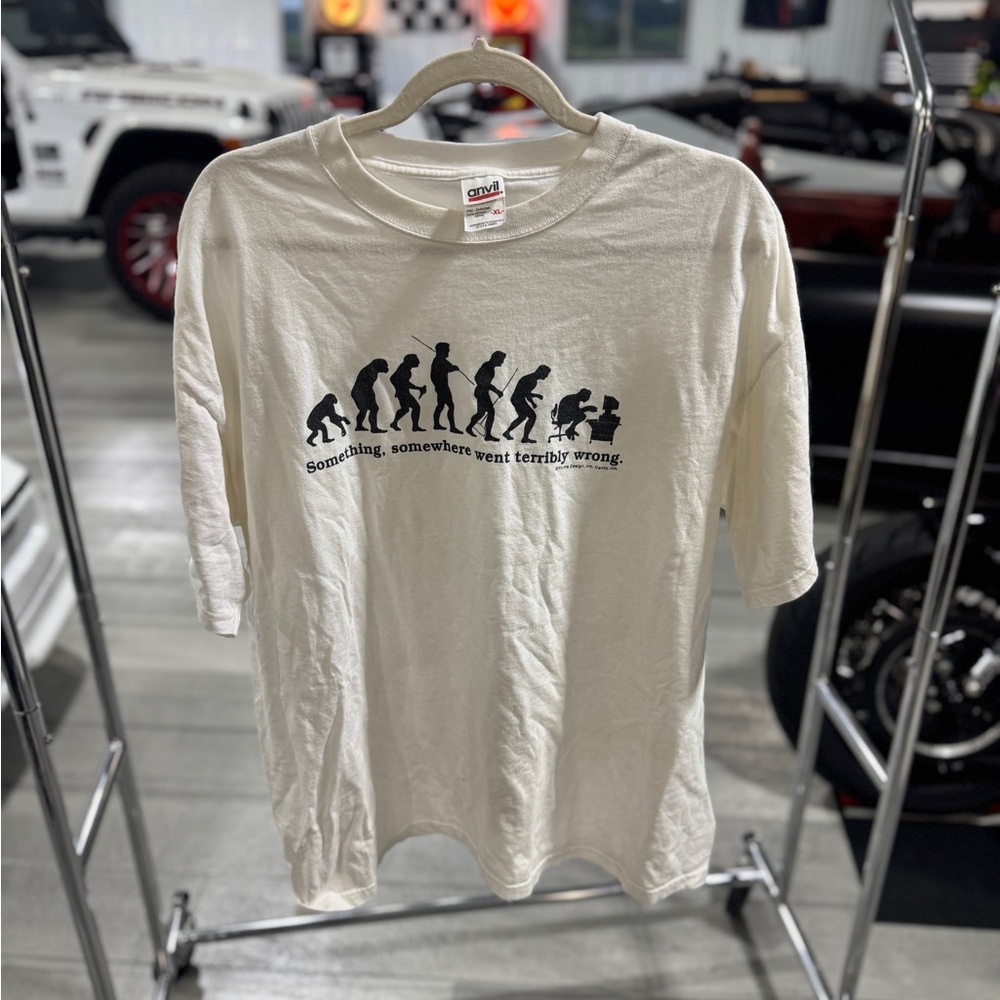 Vintage Cream Evolution Graphic T-Shirt